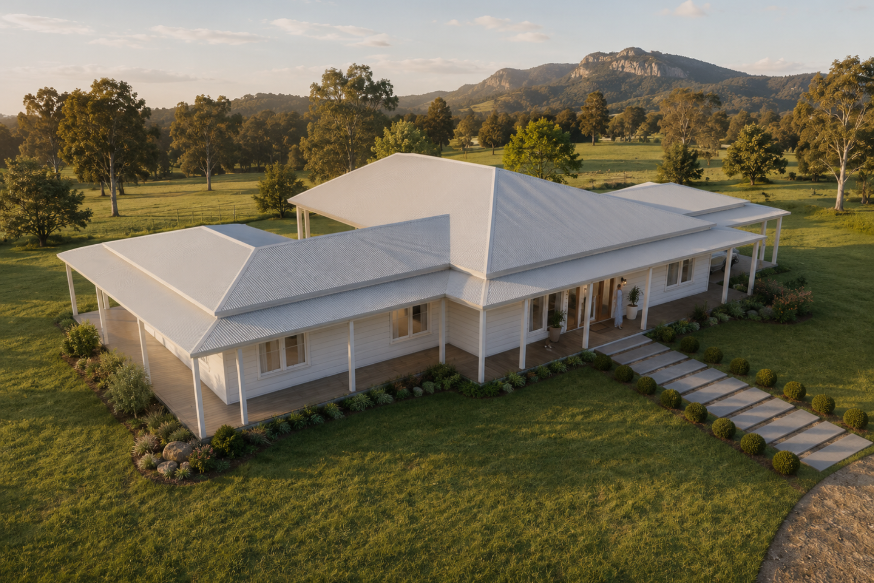 Country Homestead — aerial render showing hip roof form, wraparound verandah, stepping stone path and valley setting