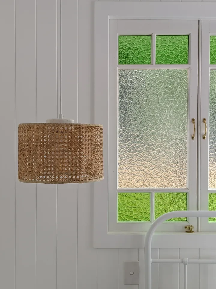 reef shack — woven pendant with green glass window