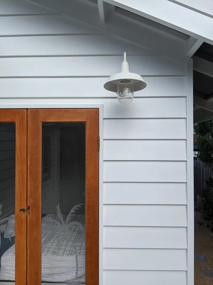 reef shack — exterior wall light with timber doors