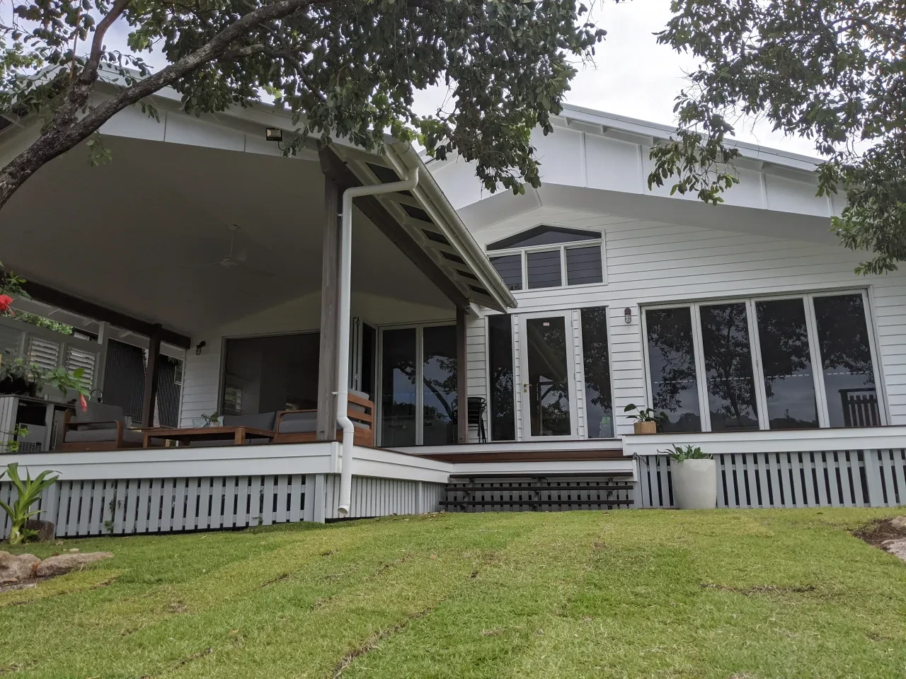 reef shack — white home with covered verandah