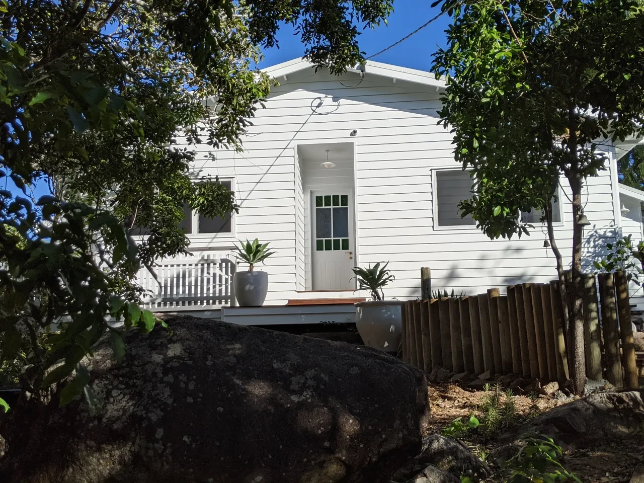reef shack — white home front entrance