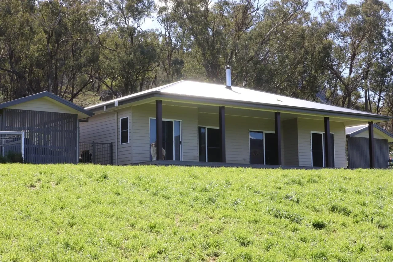 WIDDEN — completed homestead full front elevation with hip roof, verandah and outbuilding